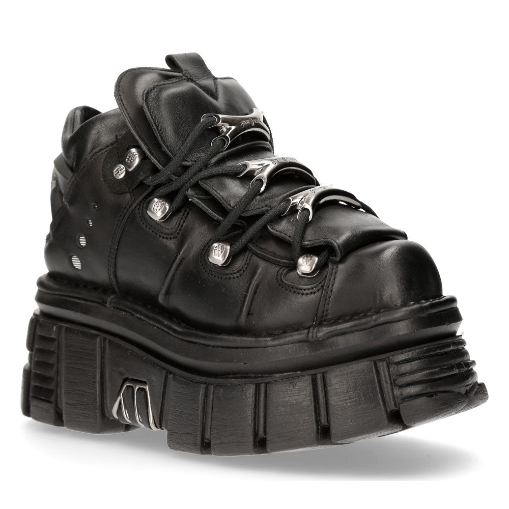 Botín M-106-S29 en tres cuartos con huesos metálicos en los cordones
