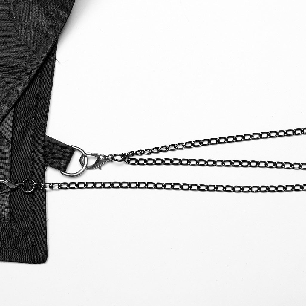Detalle de las cadenas con mosquetón enganchadas a la anilla del bajo del chaleco