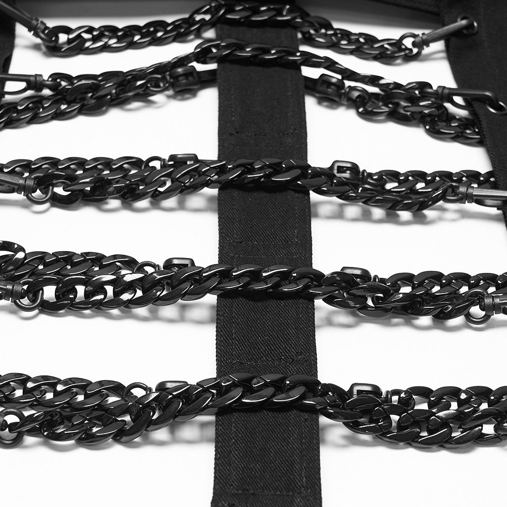 Detalle de las cadenas negras cruzando la tira central de la espalda