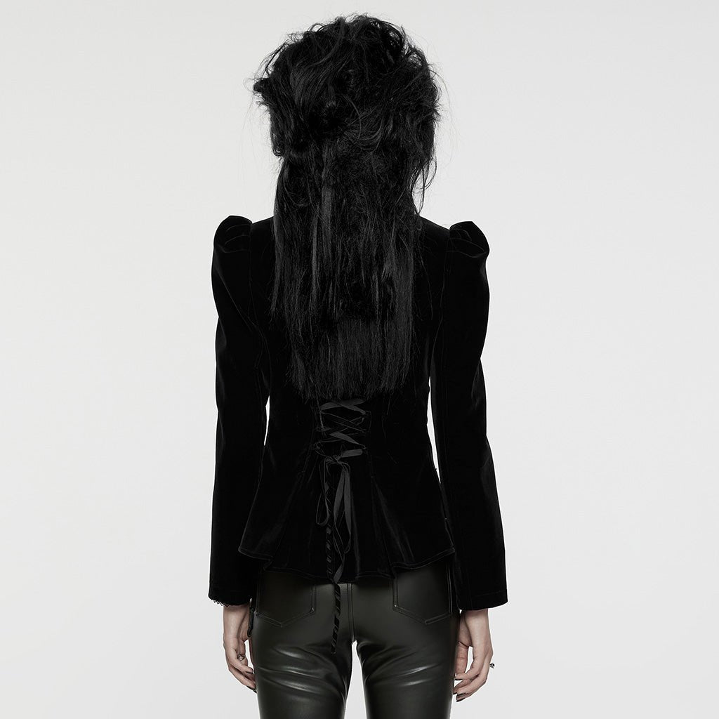 Espalda de la chaqueta de terciopelo negro con lazada de cinta en la cintura
