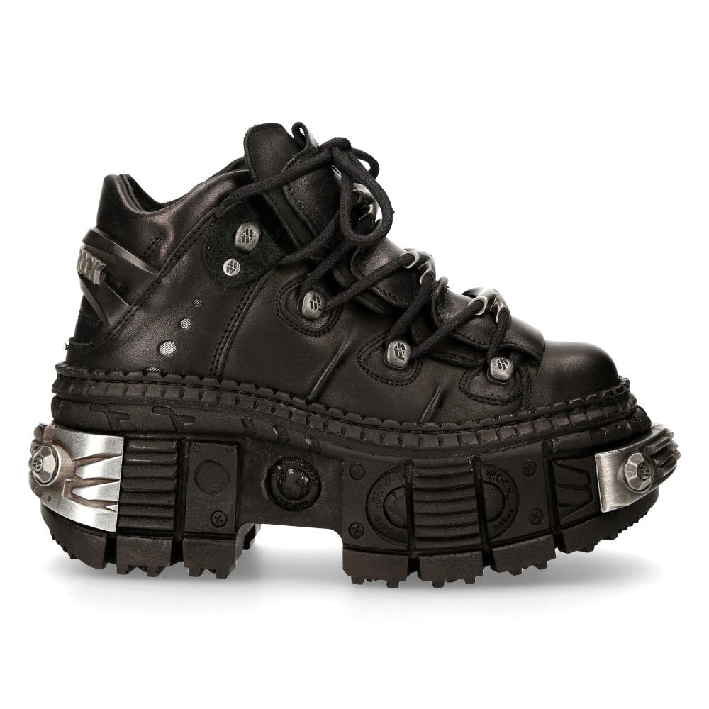 Lateral exterior del zapato New Rock M-WALL106-S10 con placas en puntera y talón y tacón de 10 cm