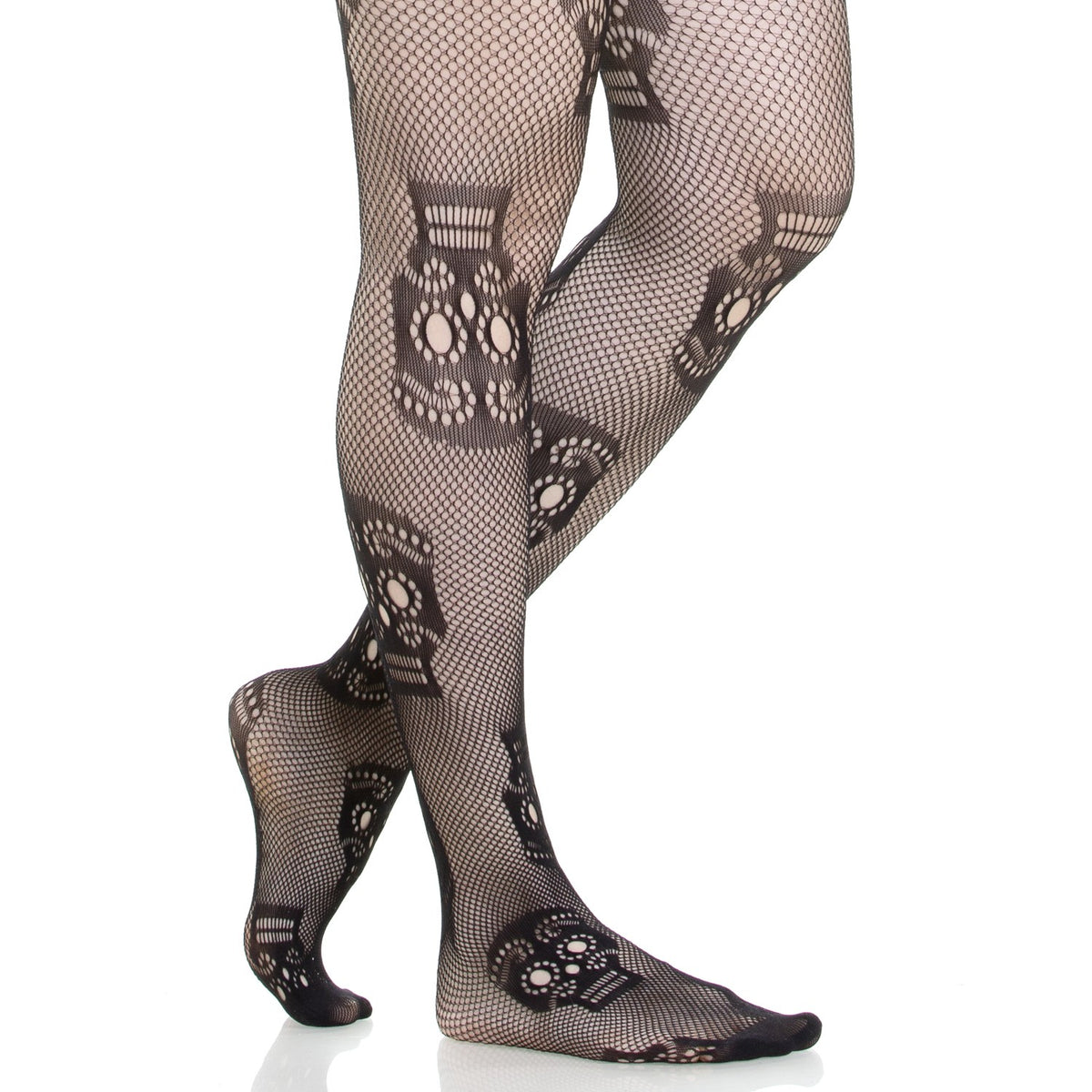 Detalle de las calaveras tejidas con ojos y dientes calados en la rejilla