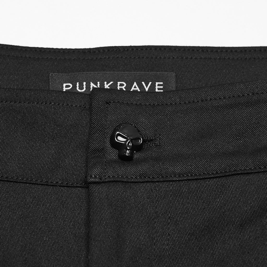 Cinturilla del pantalón con el botón negro en forma de calavera
