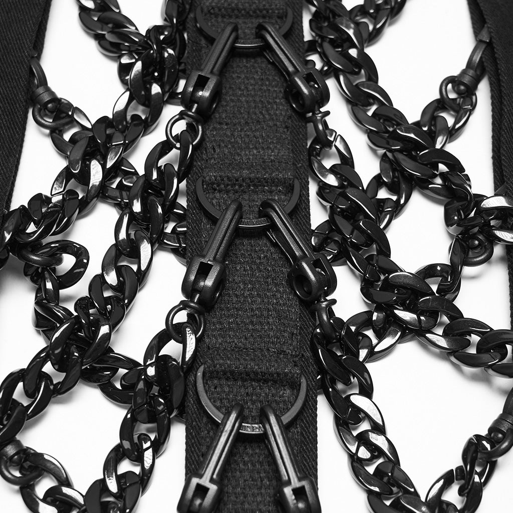Mosquetones y anillas en D que sujetan las cadenas a la tira trasera