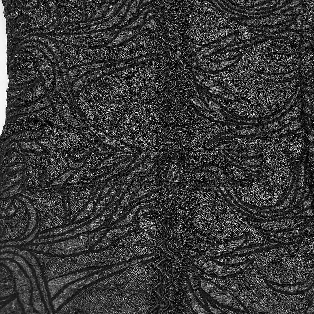 Detalle del galón ondulado y el vivo del bolsillo del chaleco negro