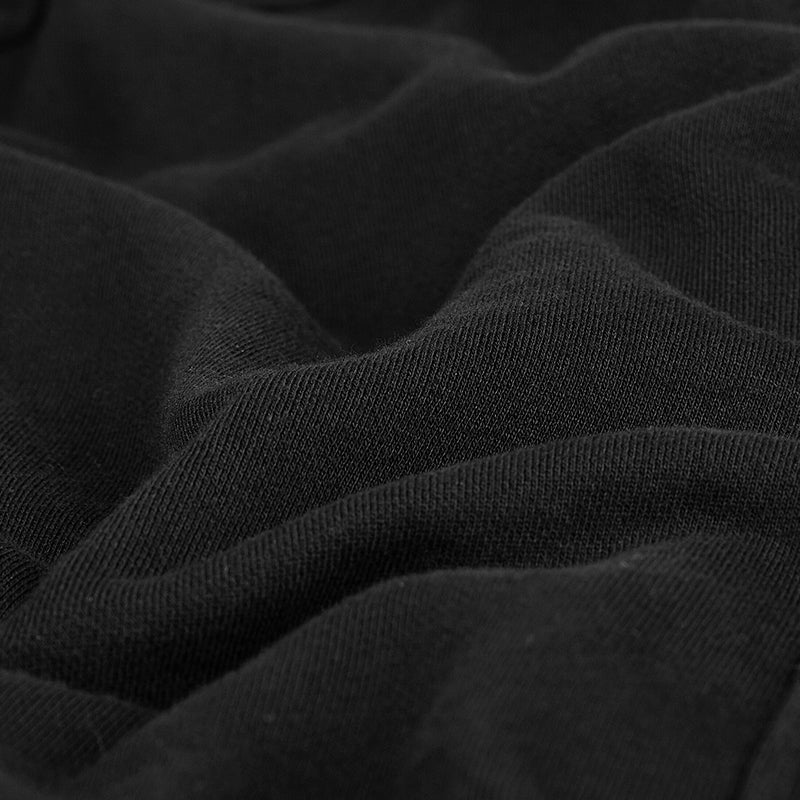Primer plano de la felpa de algodón negra de la sudadera