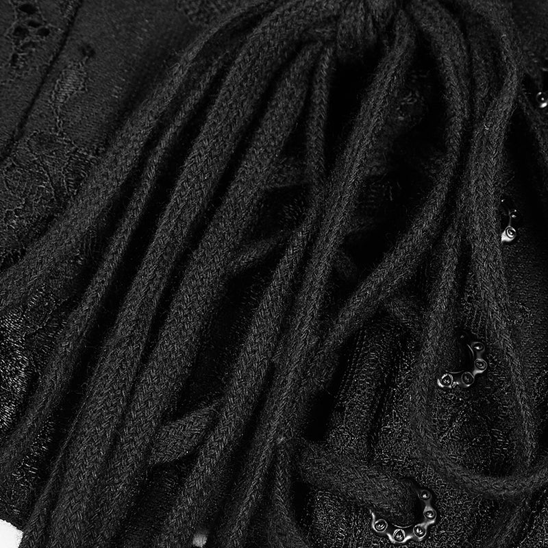 Detalle del cordón negro de la lazada trasera del corsé