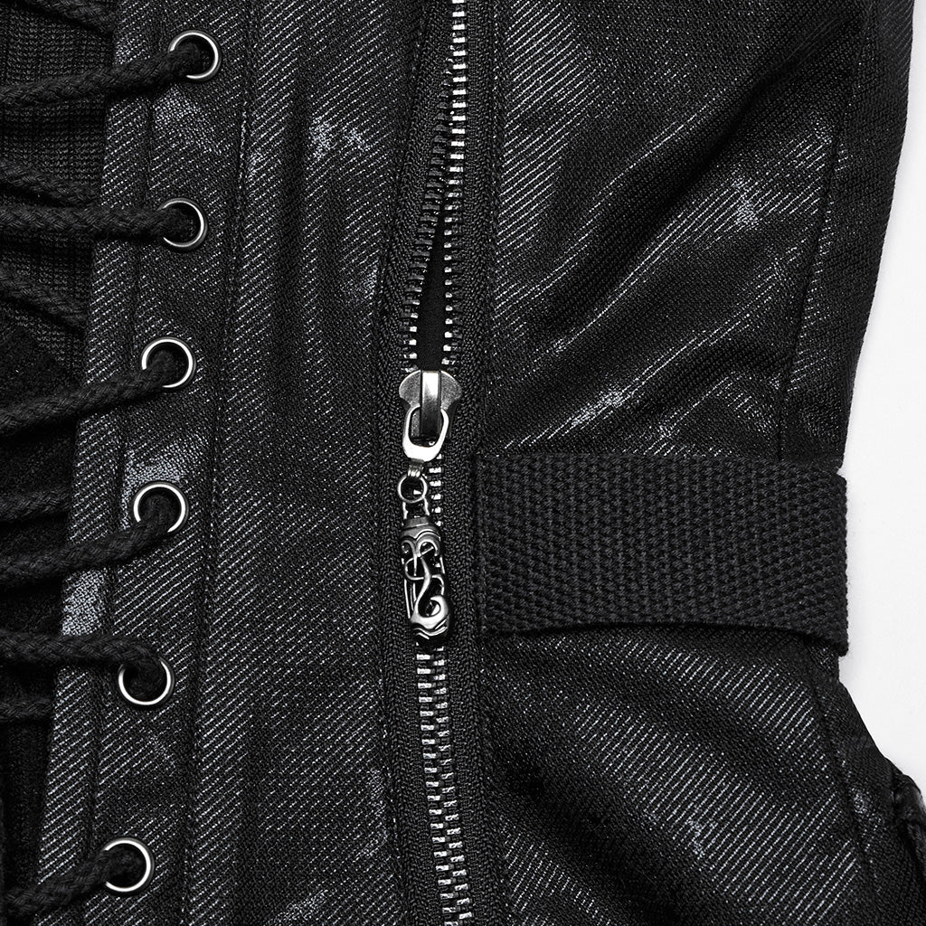 Detalle de la cremallera lateral con tirador labrado y la cincha negra
