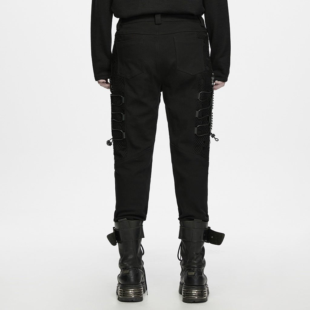 Espalda del vaquero negro con bolsillos de parche y paneles de rejilla