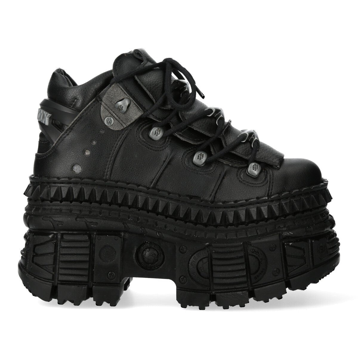 Lateral exterior del zapato New Rock M-WALL106-V16 con la franja en dientes de sierra sobre la plataforma